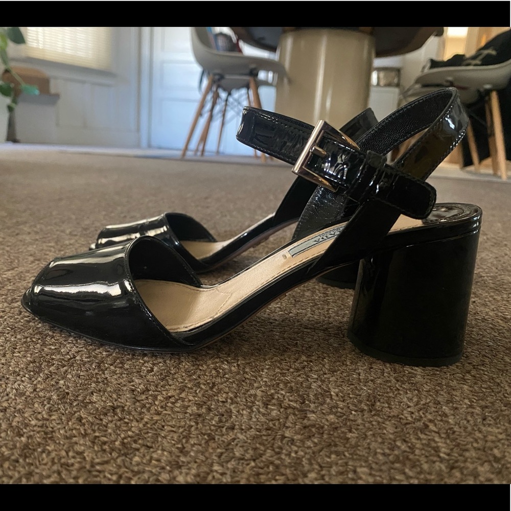 black patent leather prada heels with ankle strap